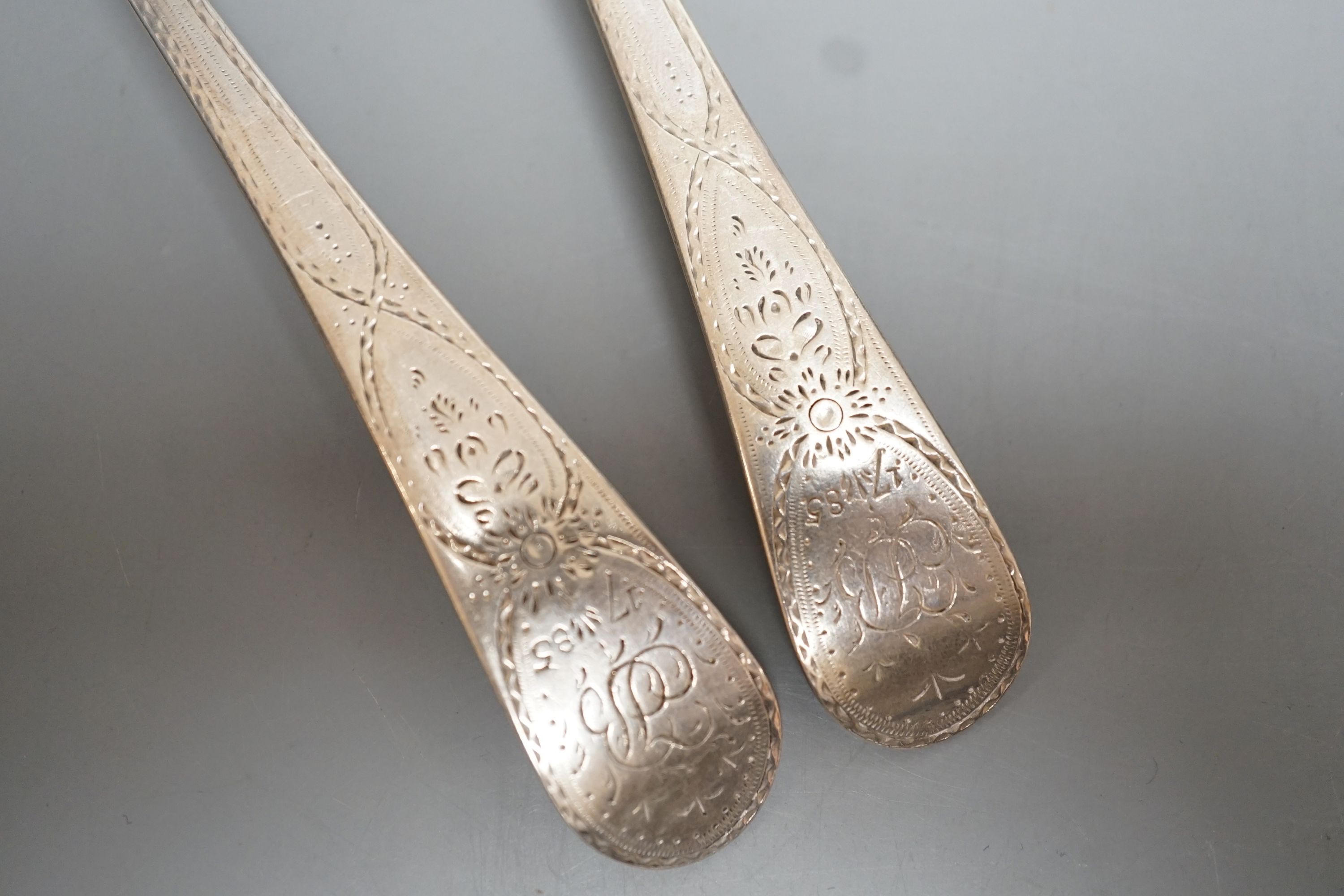 A pair of George III silver Old English spoons, with bright cut engraving, William Sumner, London, 1784